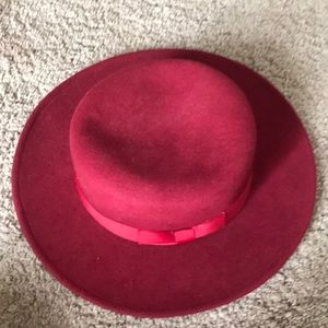 Red hat with red bow.